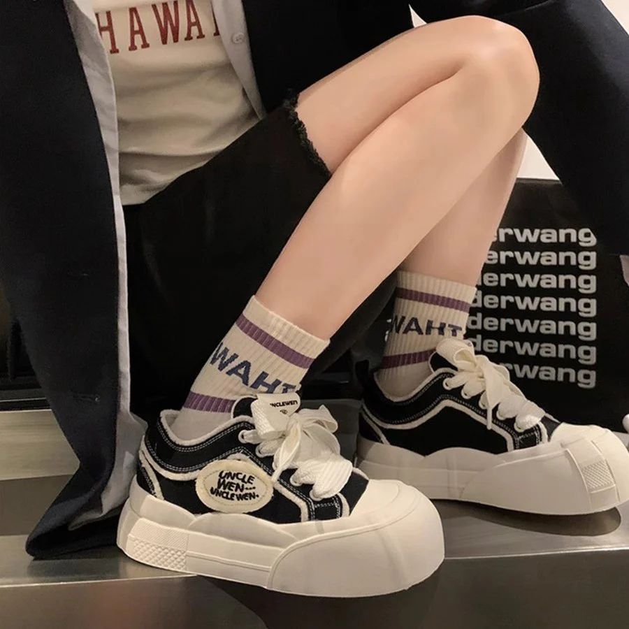 Damen Sportliche Plateau-Sneaker mit breiter Sohle und verspieltem Design Heidi Mode