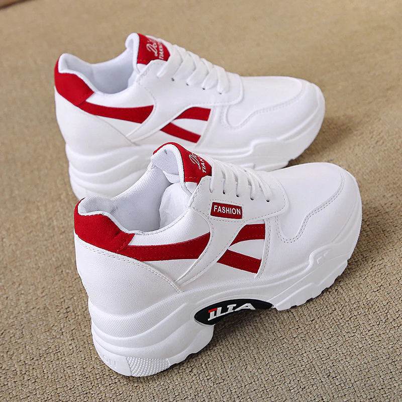 Damen Sportliche Sneakers mit dickem Profil und modischen Akzenten Heidi Mode